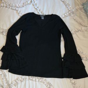 Nice light weight fabric with triple ruffle at bottom of sleeves!